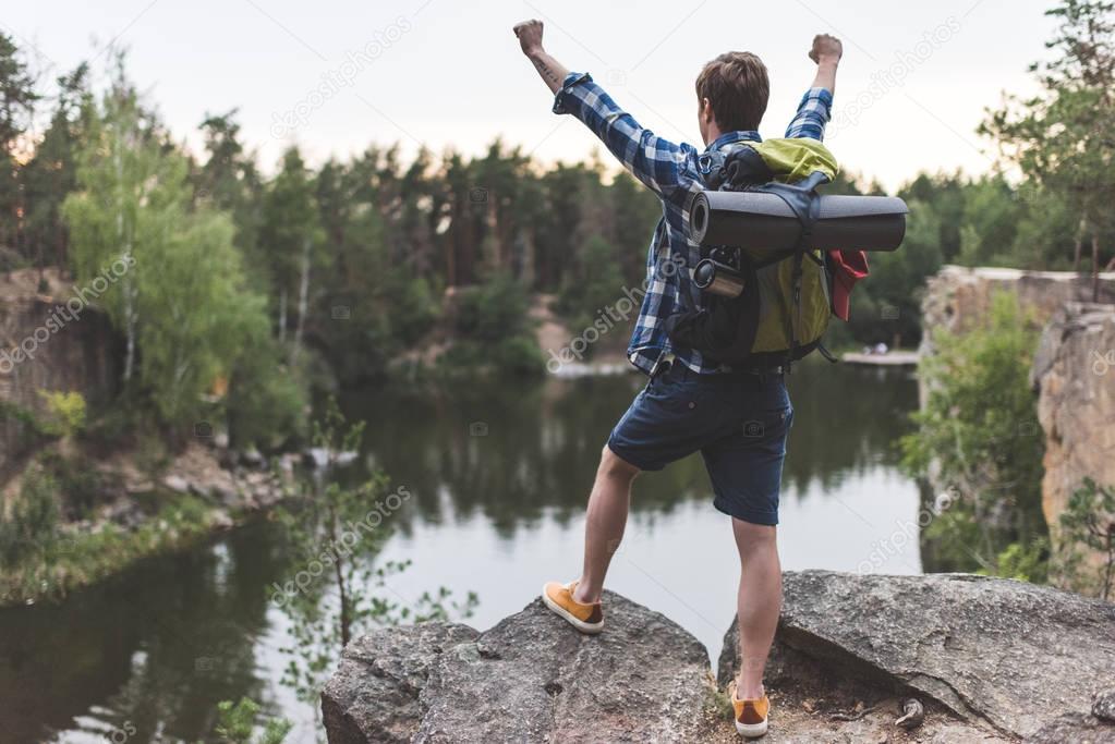 hiker celebrating victory