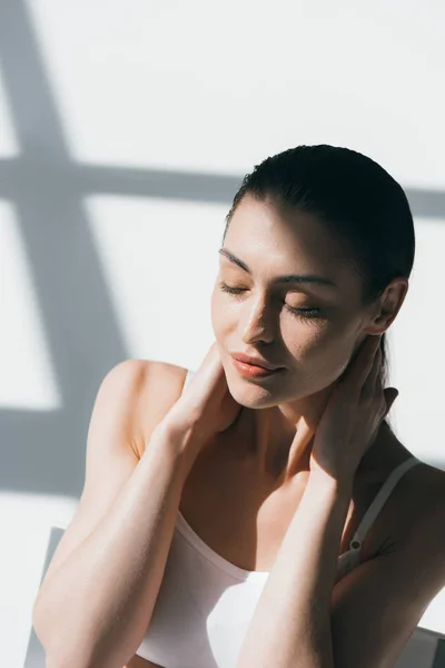 Woman with wet slicked hair — Stock Photo, Image