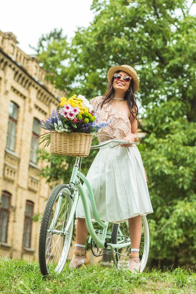 beautiful girl with bicycle