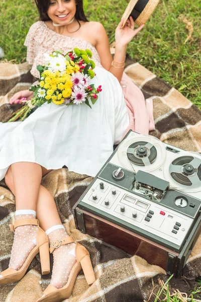 Girl with flowers and tape recorder — Stock Photo, Image