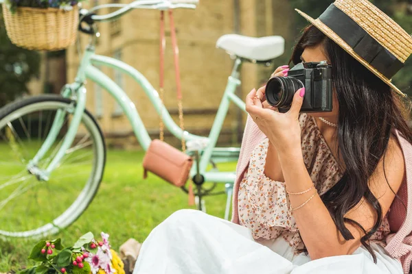 Stylish girl with camera in park — Stock Photo, Image