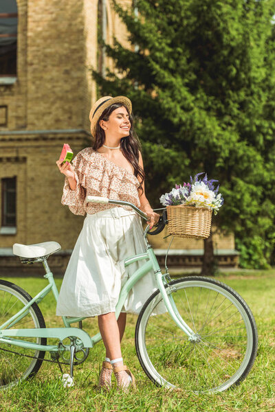 girl with watermelon and bicycle