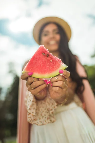 Girl holding slice of watermelon — Stock Photo, Image