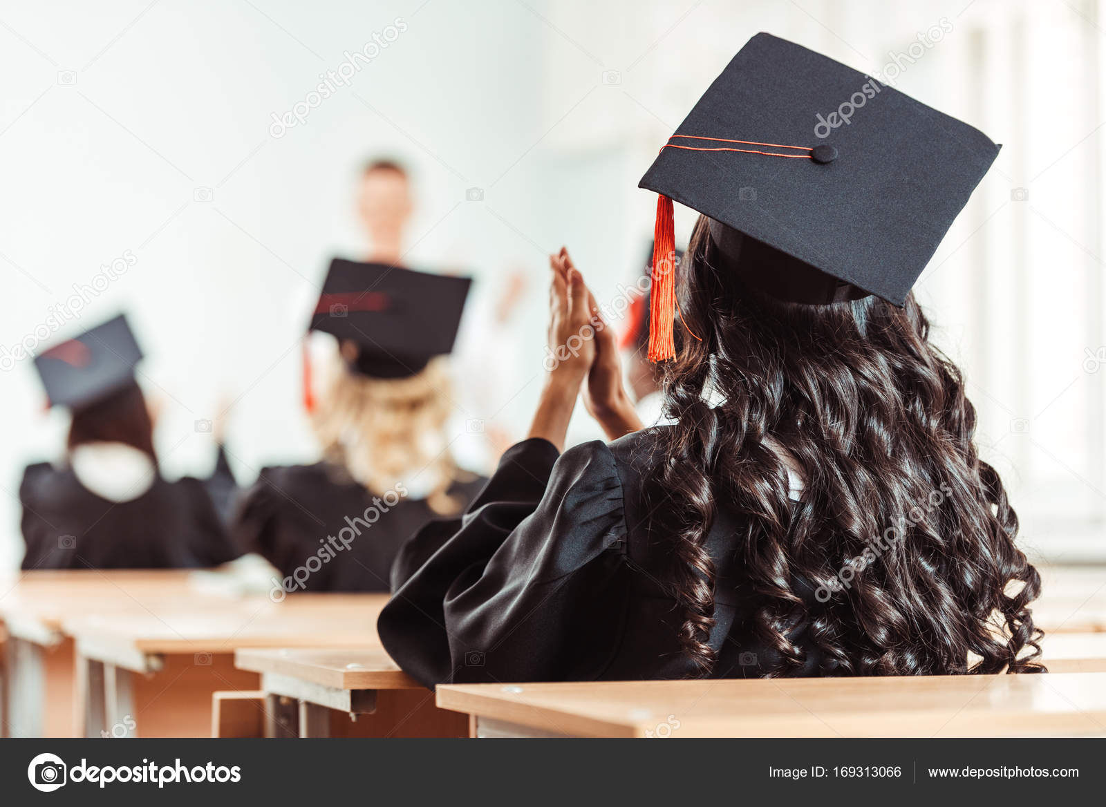 Student girl in graduation hat — Stock Photo © ArturVerkhovetskiy