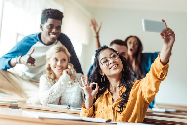 students taking selfie