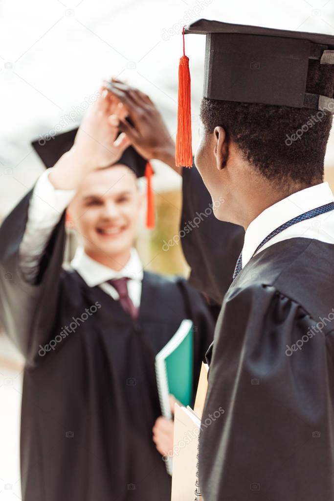 students giving high five