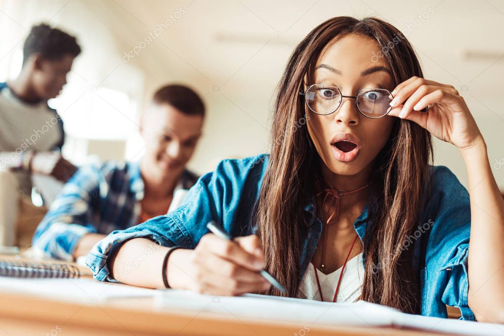 student girl studying in classroom