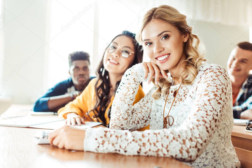 multiethnic students sitting in class