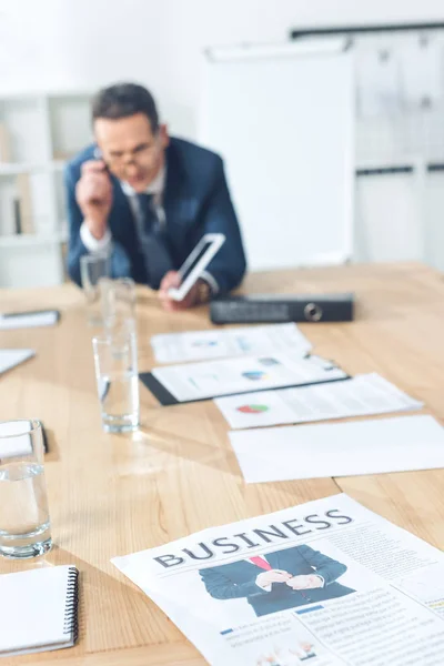 Mature businessman at conference hall — Free Stock Photo