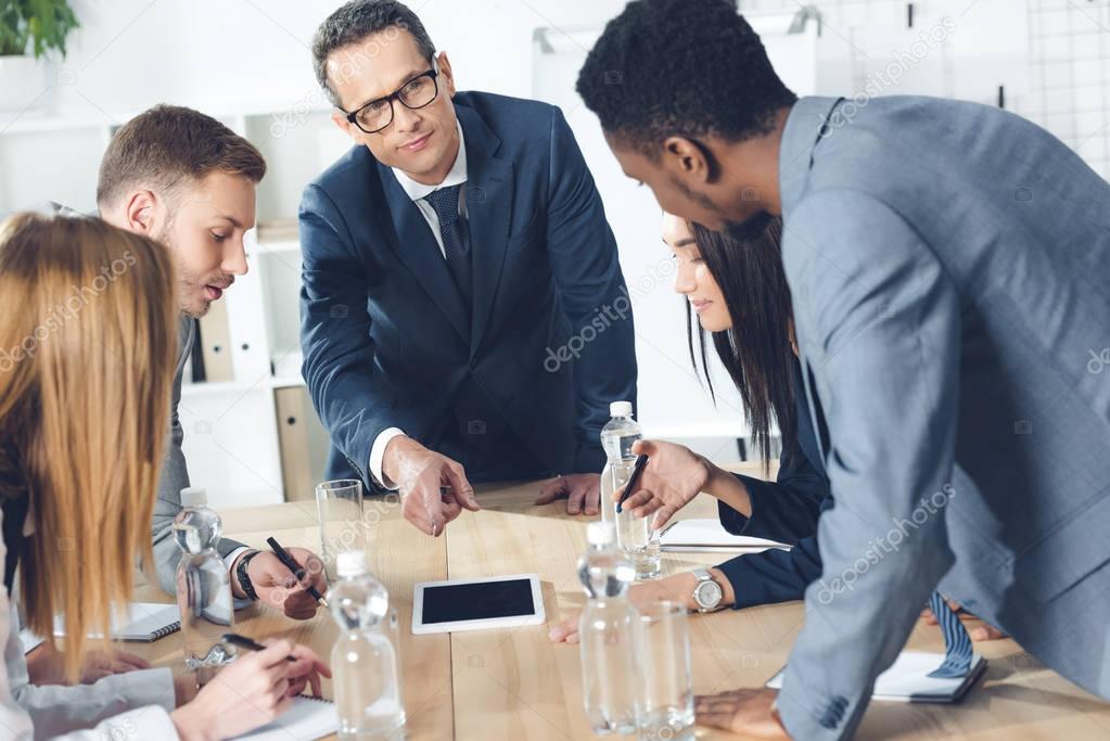 businesspeople having conversation