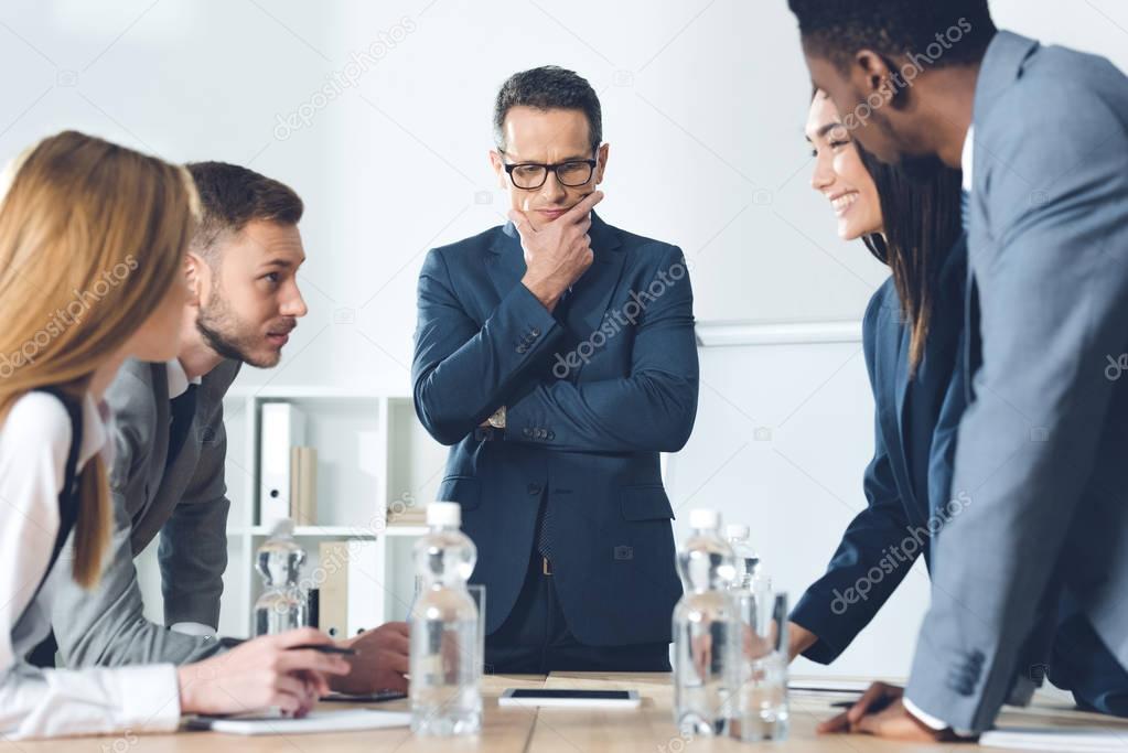 businesspeople having conversation