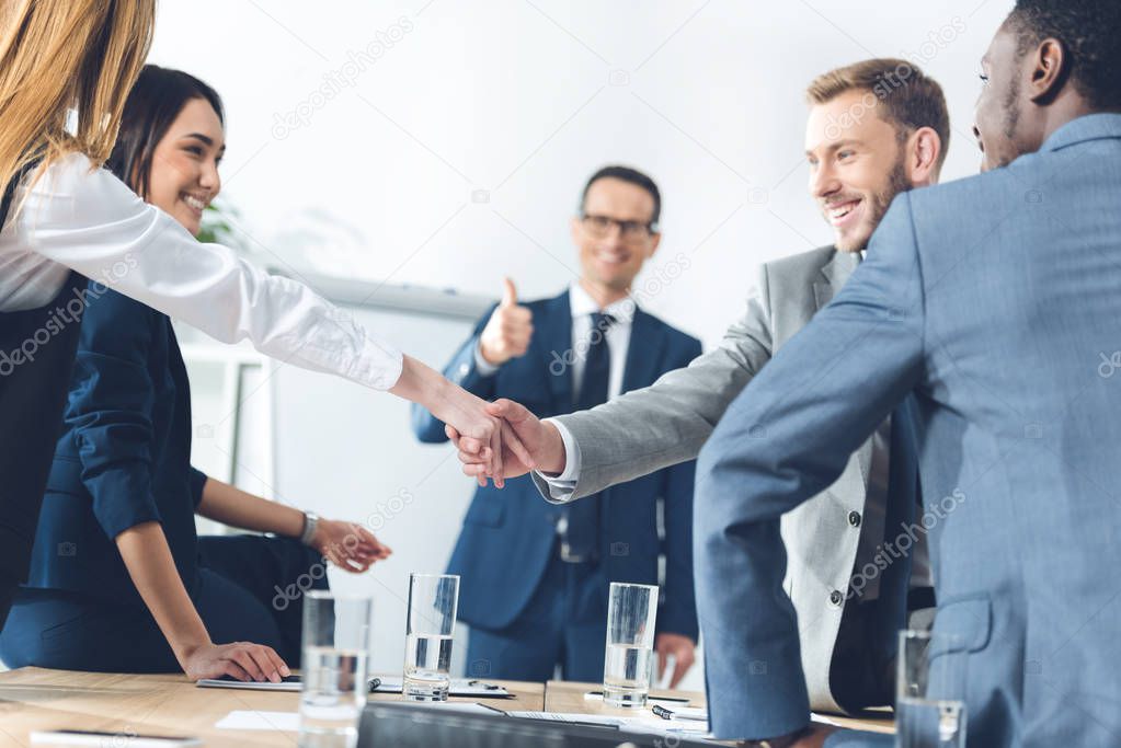 businesspeople shaking hands