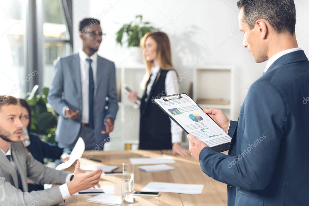 businesspeople having conversation