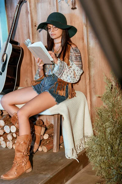 Bohemian girl reading book — Free Stock Photo