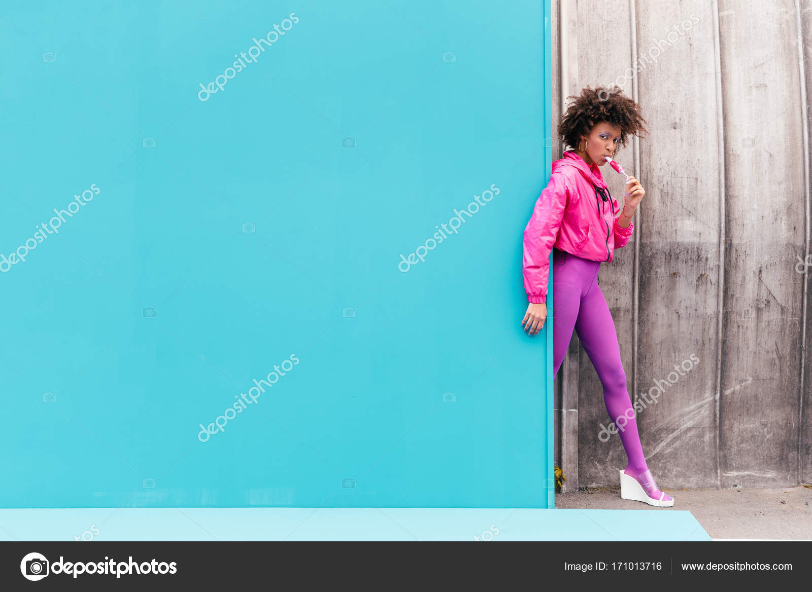 Stylish girl with popsicle Stock Photo by ©ArturVerkhovetskiy 171013716