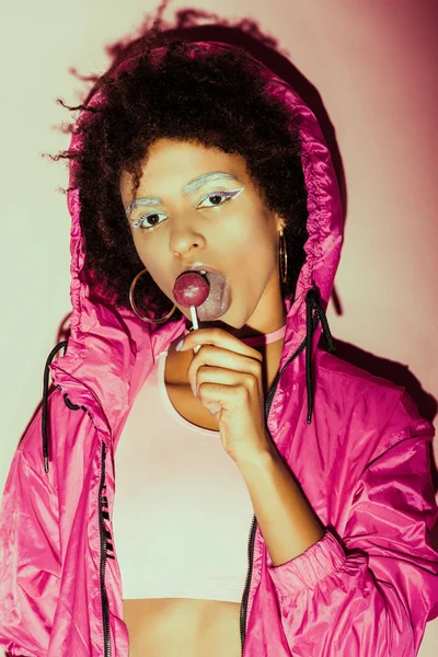 Afro 80s girl with lollipop — Stock Photo, Image