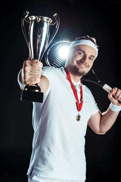 Tennis player with champion goblet — Stock Photo, Image