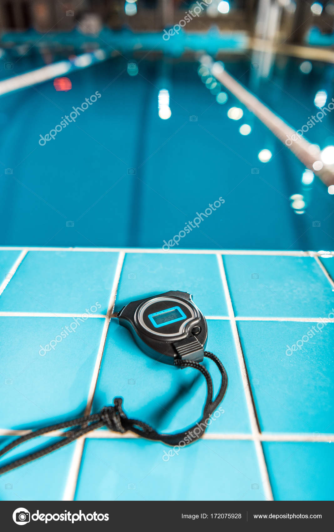 Stopwatch at swimming pool Stock Photo by ©ArturVerkhovetskiy 172075928