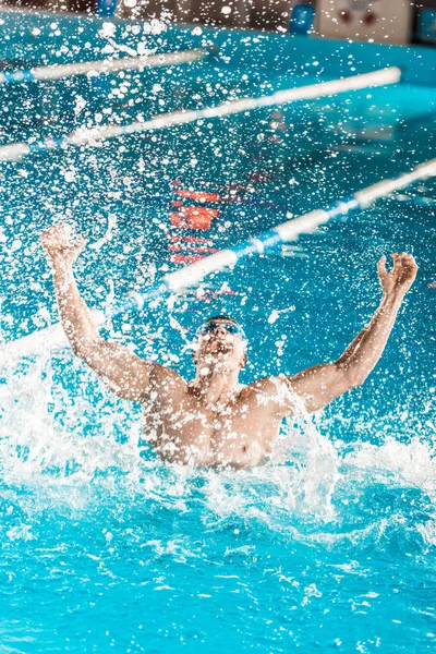 Handsome winning muscular swimmer — Stock Photo, Image