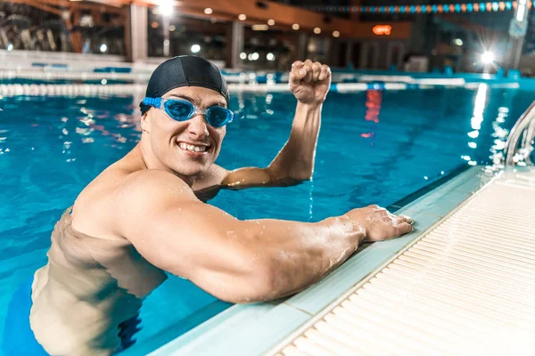 Winner in swimming pool — Stock Photo, Image