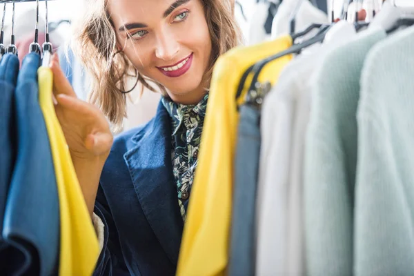 Fashion designer with clothes — Stock Photo, Image