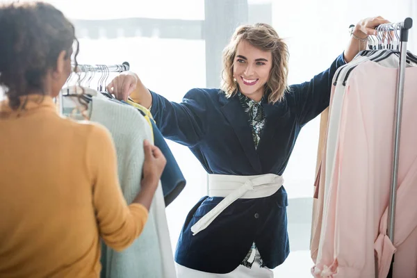 Fashion designers working with clothes — Stock Photo, Image