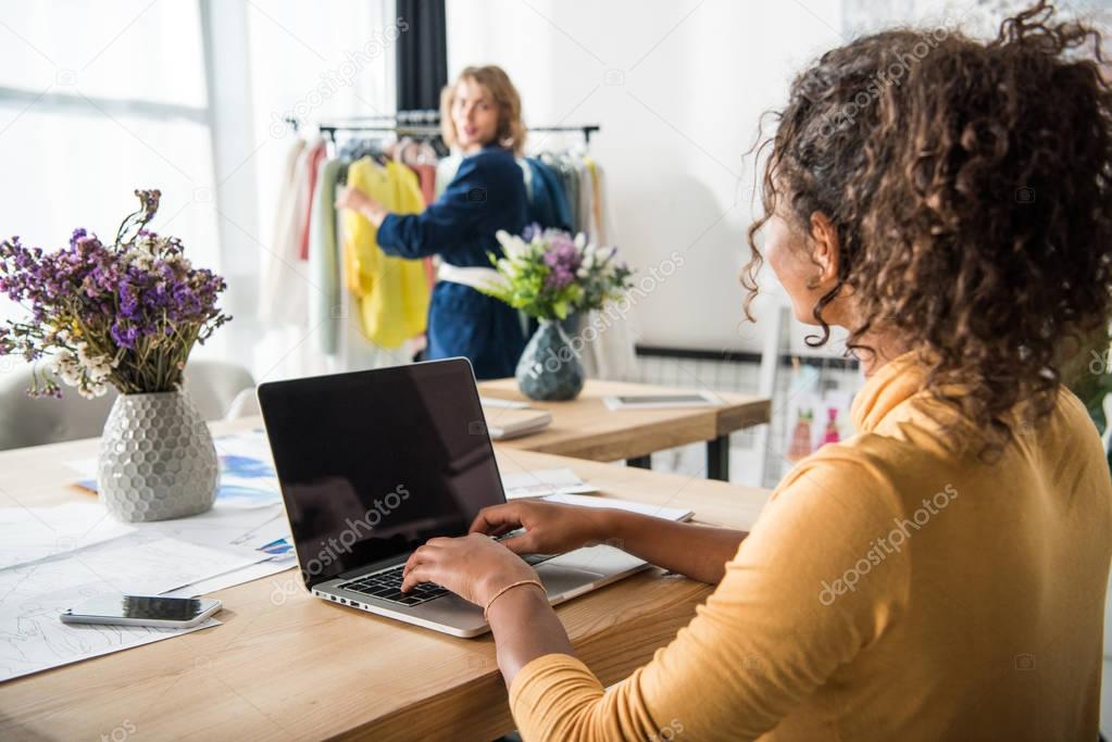 fashion designer with laptop
