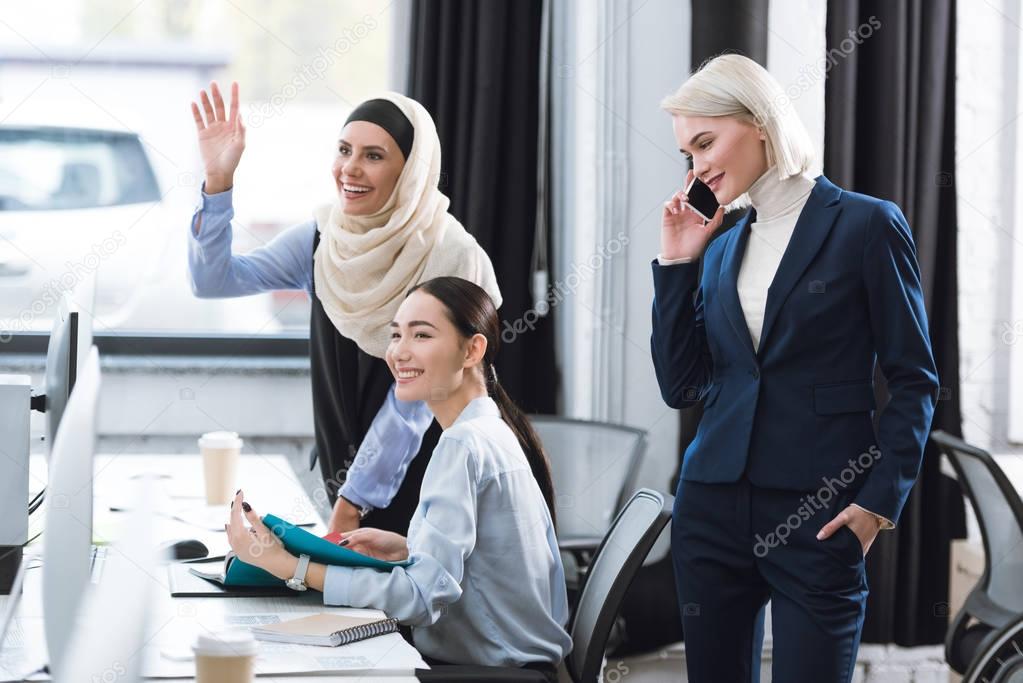 multicultural businesswomen at workplace in office