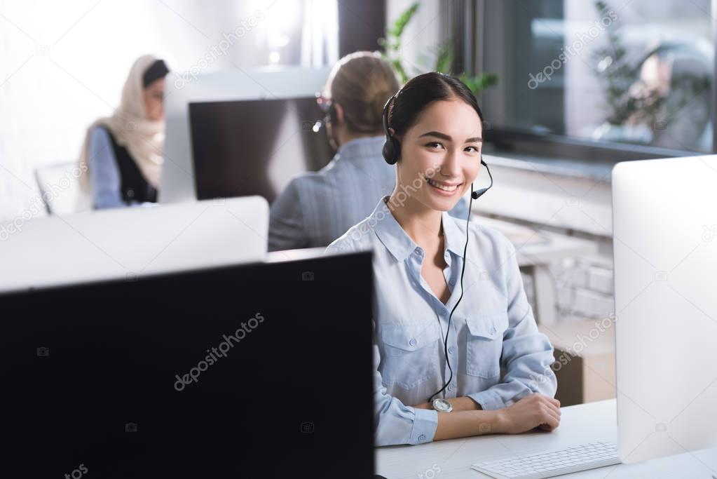 asian call center operator in headset
