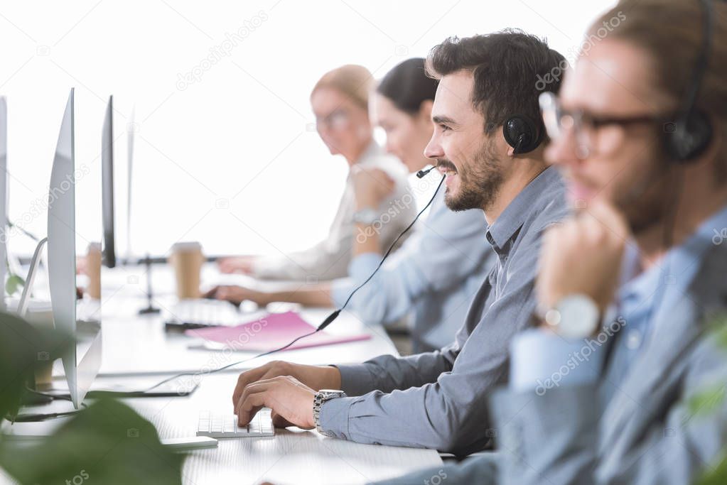 call center operator in headset in office