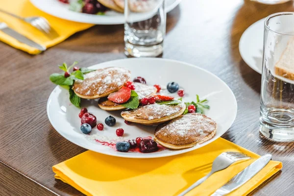 Pancakes with berries and mint — Stock Photo, Image