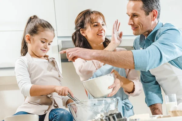 Happy Family Making Dough Looking Each Other Kitchen — Stock Photo, Image