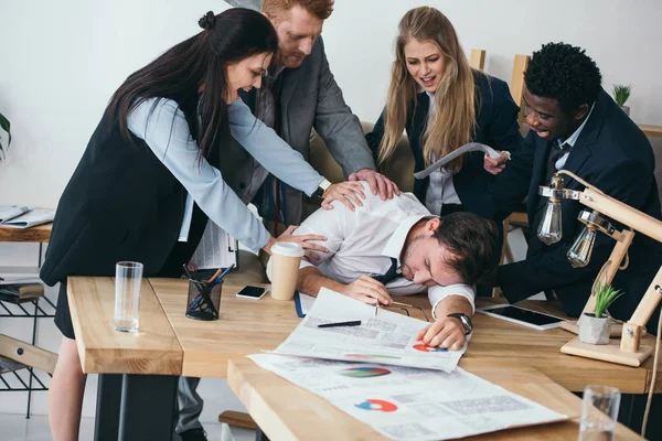 Boss Sleeping His Office While Managers Trying Wake Him Shouting — Free Stock Photo