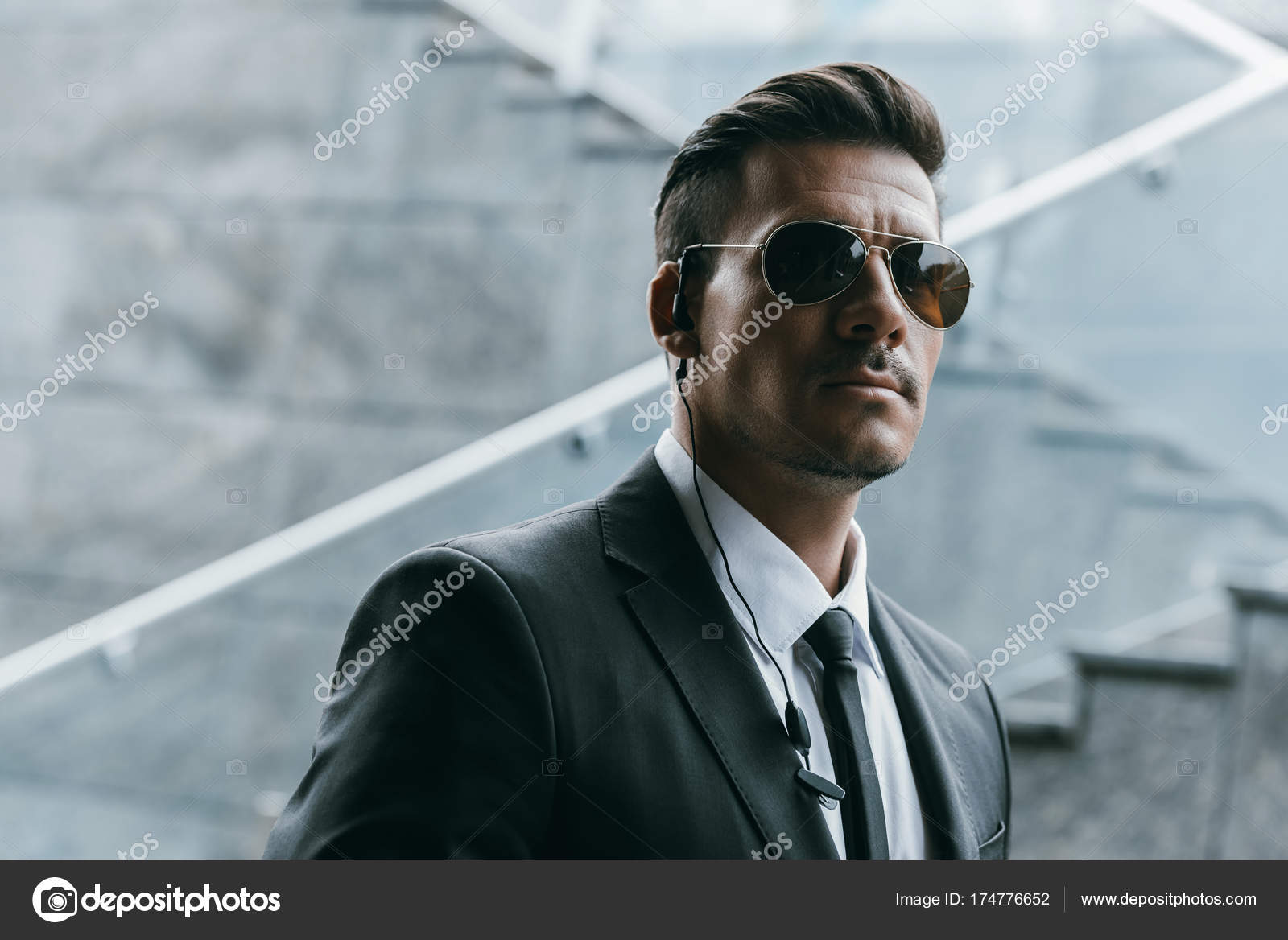 Handsome Security Guard Standing Sunglasses Security Earpiece Stock