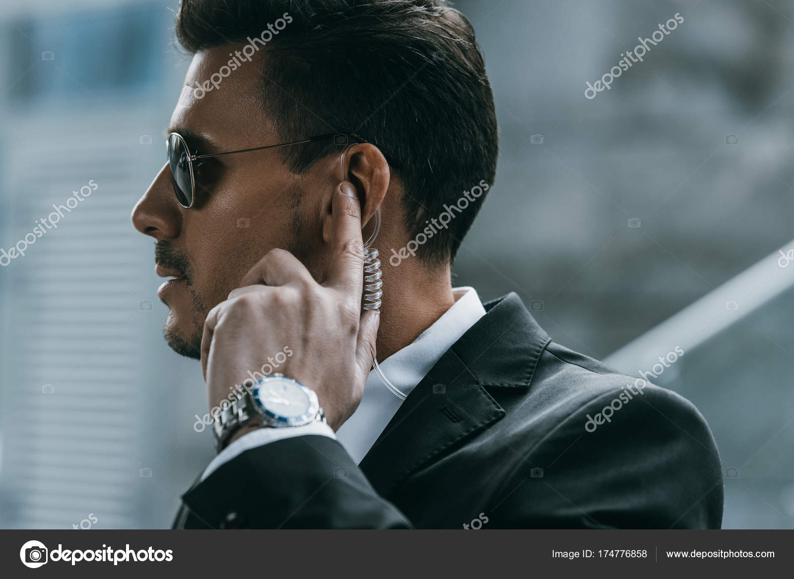 Handsome Security Guard Standing Listening Message Security Earpiece