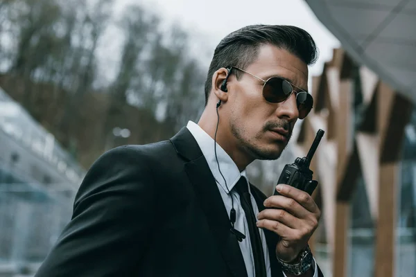 Serious Handsome Security Guard Talking Portable Radio — Stock Photo, Image