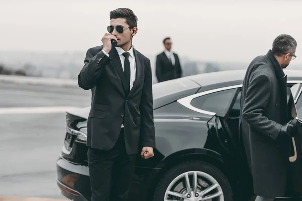 Bodyguard Talking Portable Radio Businessman Car — Stock Photo, Image