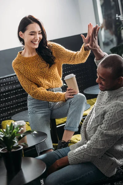 Young Couple Spending Time Cafe Giving High Five — Stock Photo, Image