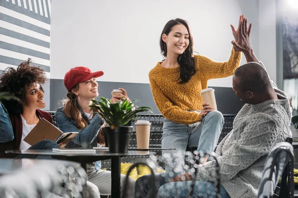 Group Young Friends Spending Time Cafe Giving High Five — Stock Photo, Image