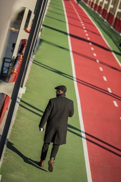 Stylish Middle Aged Man Walking Pedestrian Bridge — Free Stock Photo