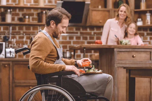 Side View Smiling Man Wheelchair Cutting Vegetables Salad While Happy — Stock Photo, Image