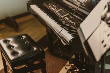electric piano in sound recording studio clipart
