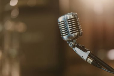 close-up shot of vintage microphone on blurred background clipart