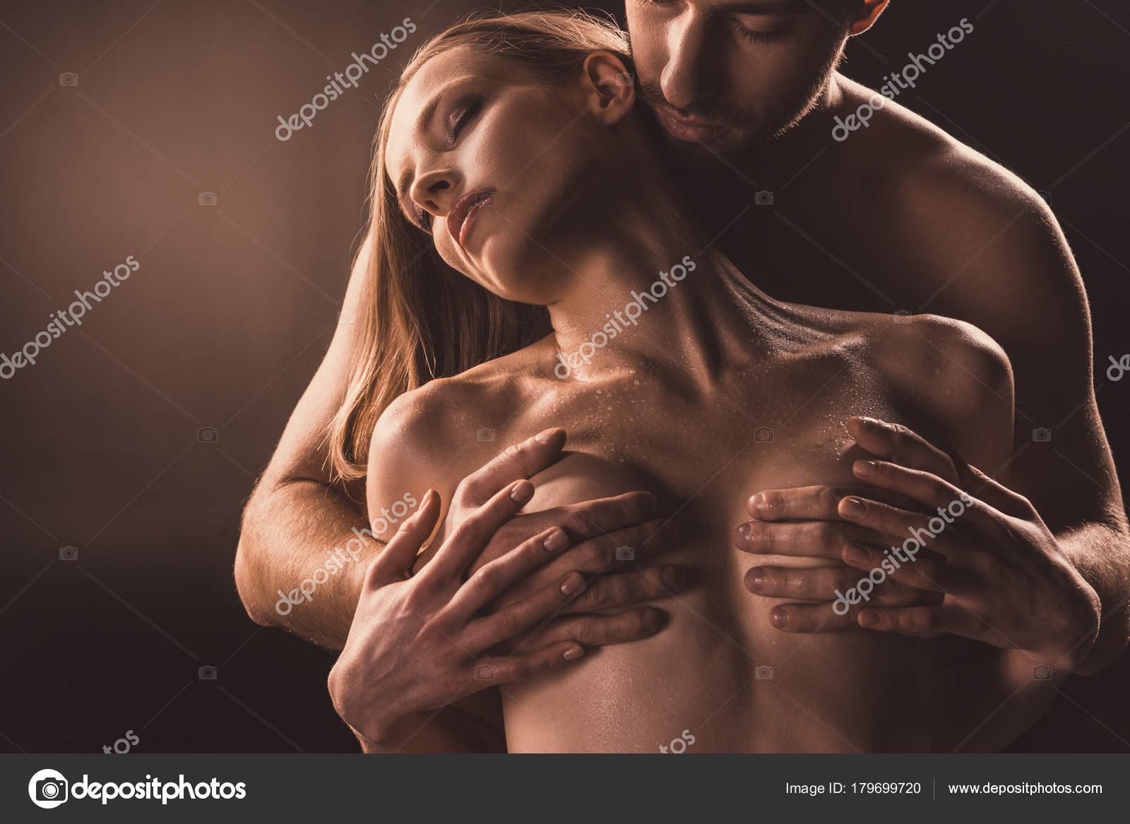 Boyfriend pressing girlfriend boobs