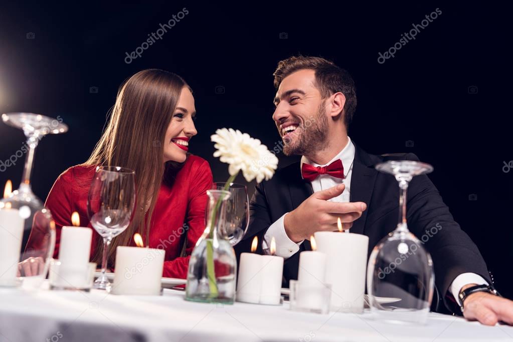 beautiful couple spending time on romantic date in restaurant