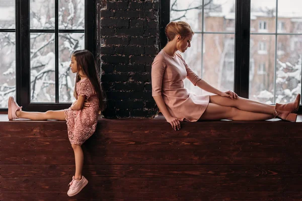 Depressed Mother Daughter Sitting Windowsills Back Back — Stock Photo, Image