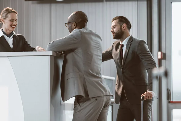 Businessmen Standing Airport Reception Buy Tickets — Stock Photo, Image