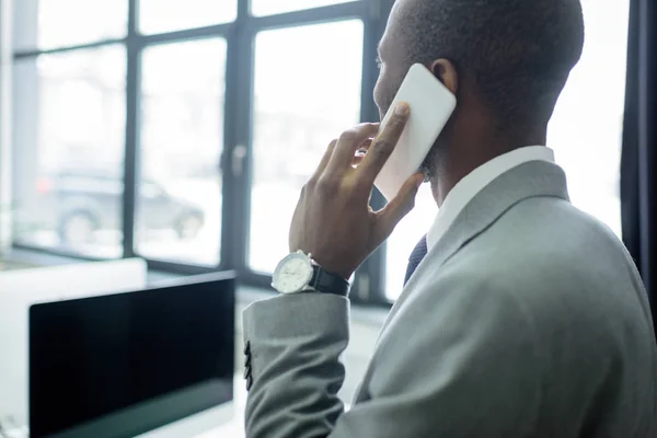 Partial View African American Businessman Talking Smartphone — Free Stock Photo