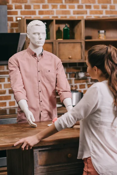 Selective Focus Woman Giving Cupcake Manikin Casual Clothing Loneliness Concept — Free Stock Photo