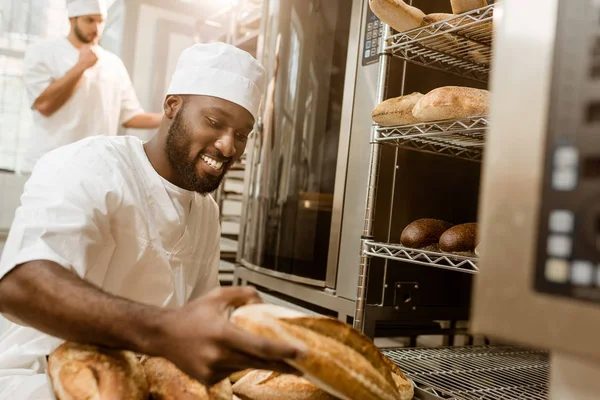 Happy African American Baker Tray Fresh Loaves Bread Baking Manufacture — Stock Photo, Image